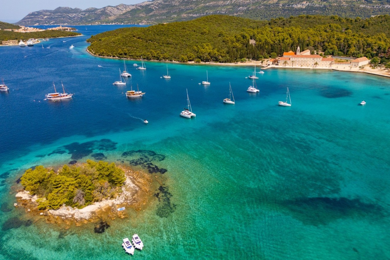 Aerial view of Korčula harbour and turquoise sea on the Croatian Adriatic