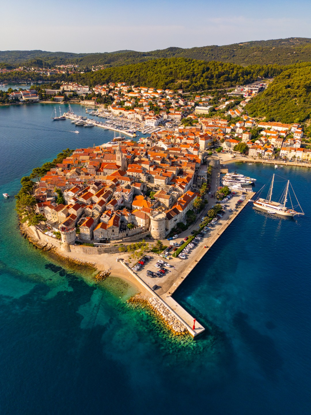 Aerial view of Korčula Old Town's red roofs and harbour, Croatia